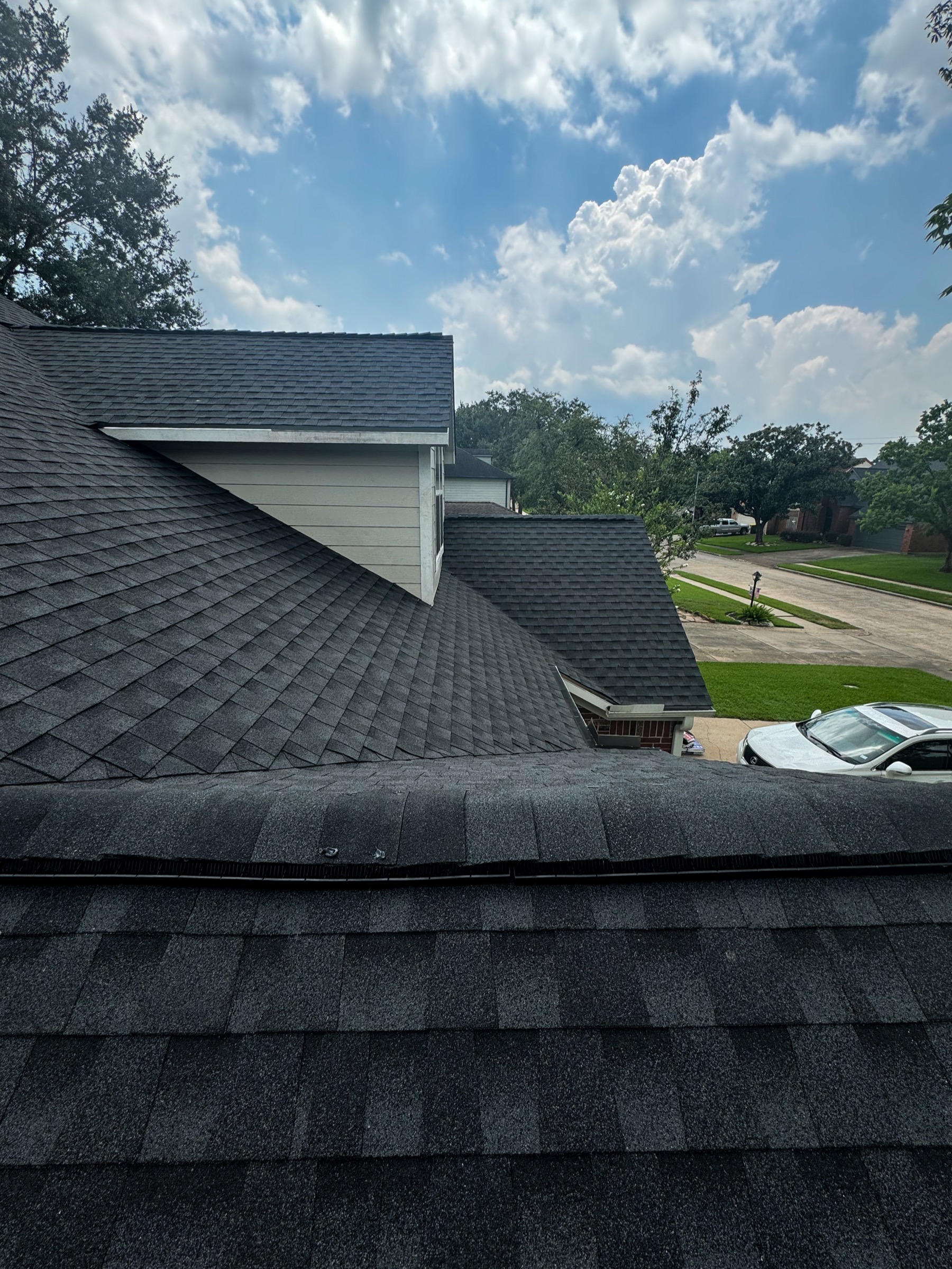 Friendswood residential roof and dormer with gray shingles